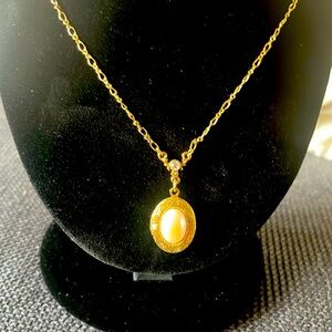 1928 locket necklace.